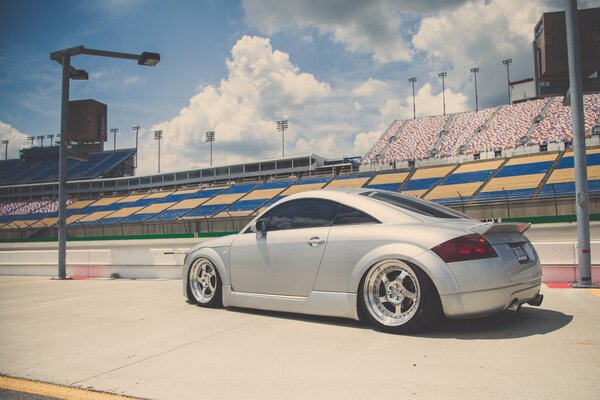 Silver Audi sports car on the podium