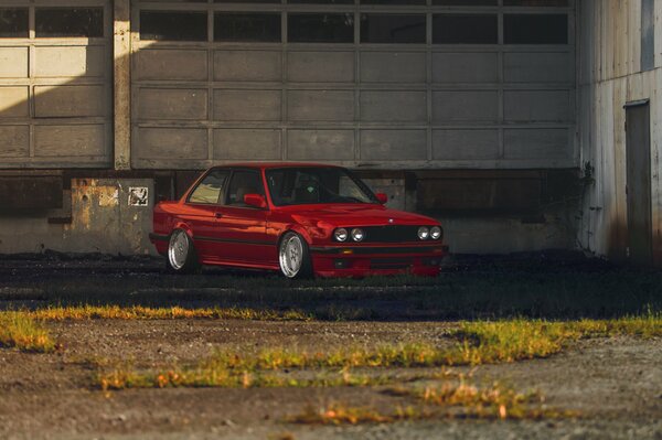 Classic red BMW e30 in a new tuning