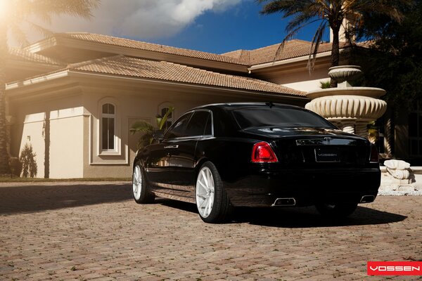 Rolls royce view from the rear next to the summer fan