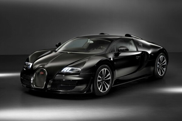 Coche Bugatti negro sobre fondo gris