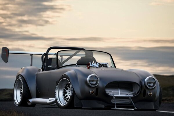 Shelby cobra on the background of the evening sky, unusual tuning