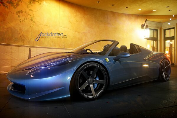 An Italian Ferrari stands at the entrance