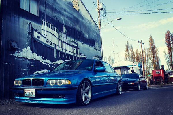 Blue tuned BMW in the parking lot