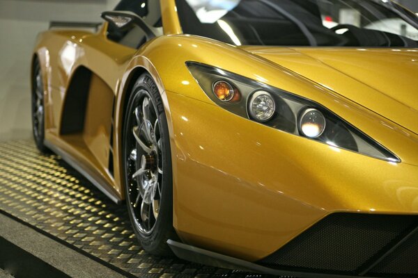 A sports car from the Kepler company in golden color