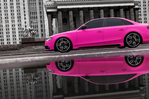 Pink audi on black and white background