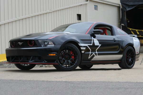 Black Ford Mustang with fine tuning