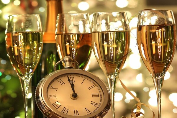 New Year. The clock is striking twelve. Champagne