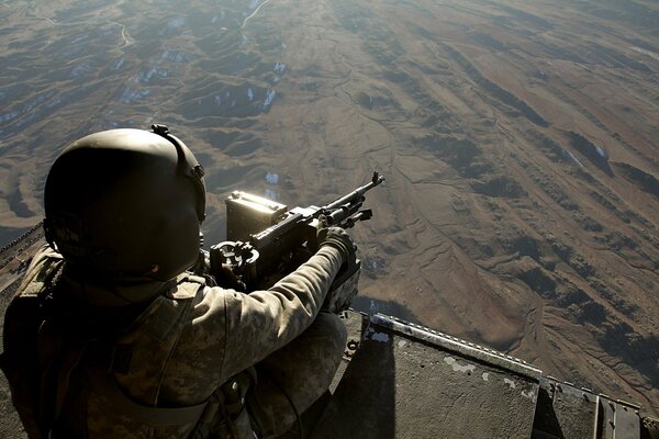 Sniper. Aim. War. A soldier with a gun