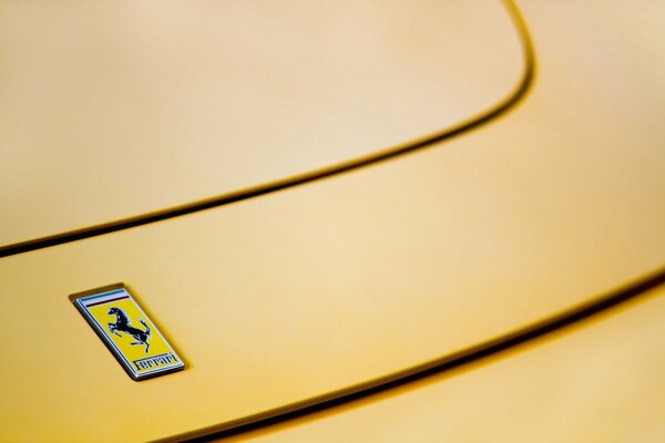 Ferrari logo on the yellow hood