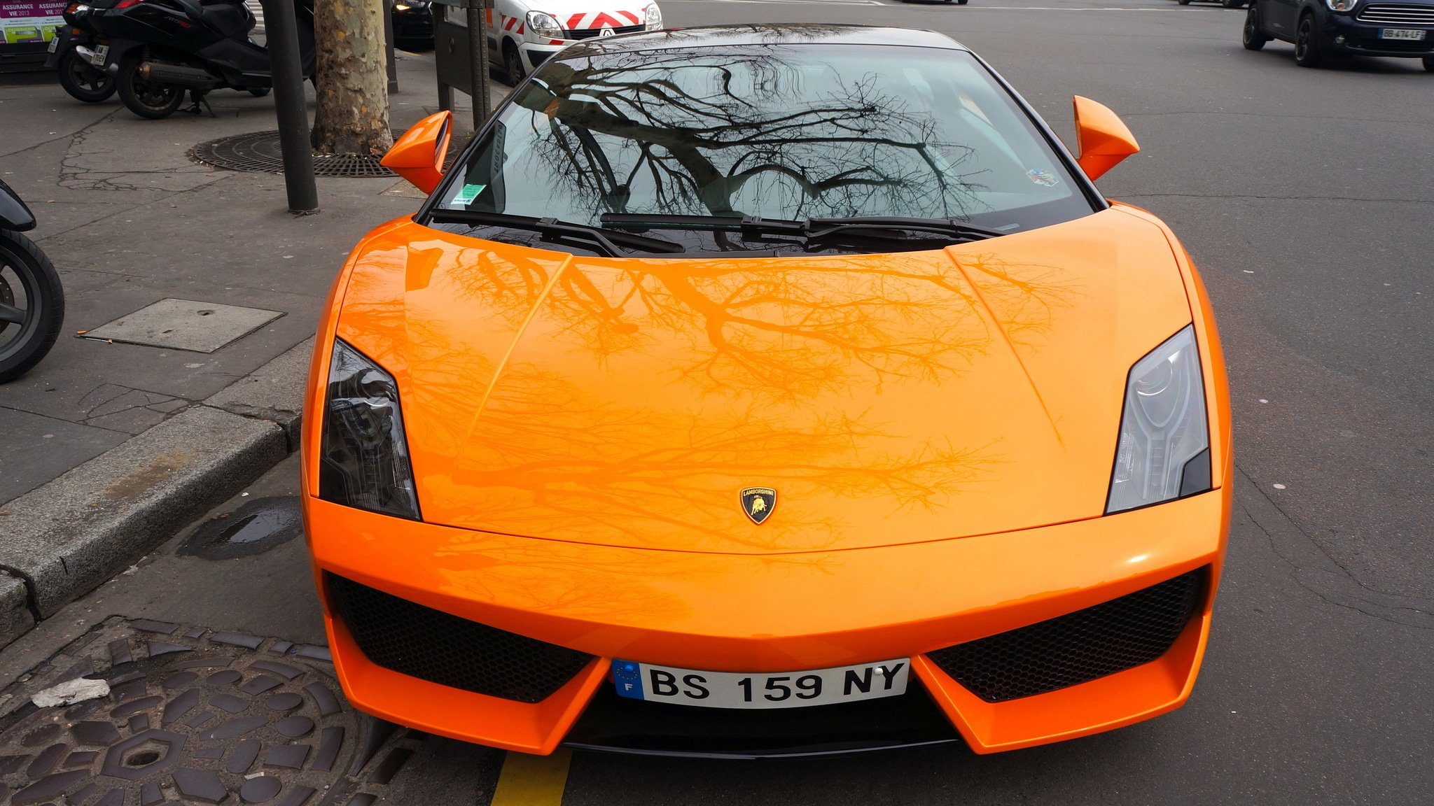 lamborghini gallardo orange supercar front reflection town