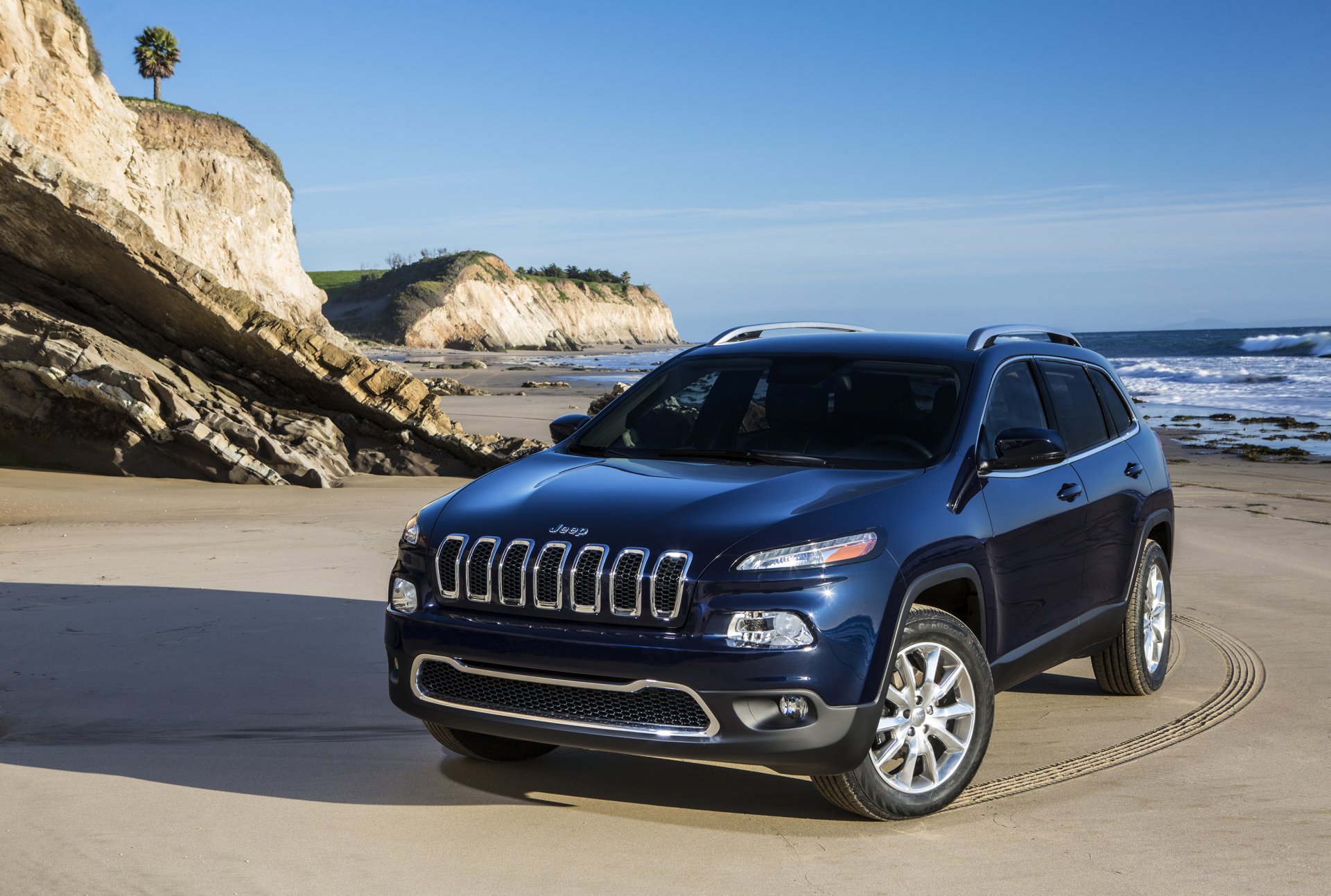 mar costa jeep cherokee limited huellas sombra