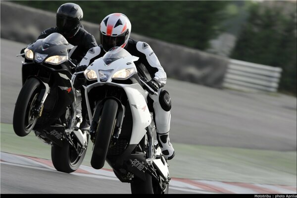 Two bikers on sportbikes