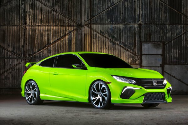 Light green Honda civic in the garage