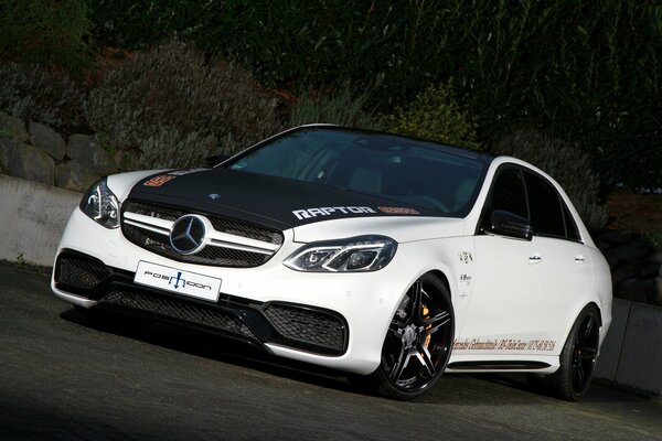 White Mercedes with dark hood