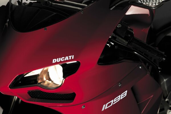 Headlights of a red ducati motorbike