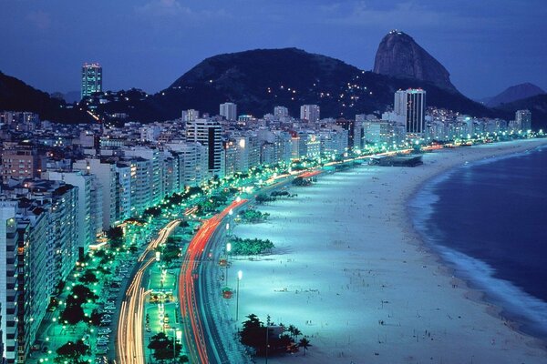 Night city of Rio de Janeiro on the beach