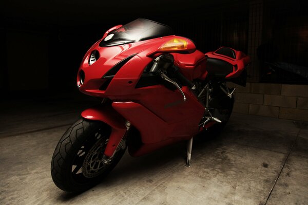 Red sports bike in the garage