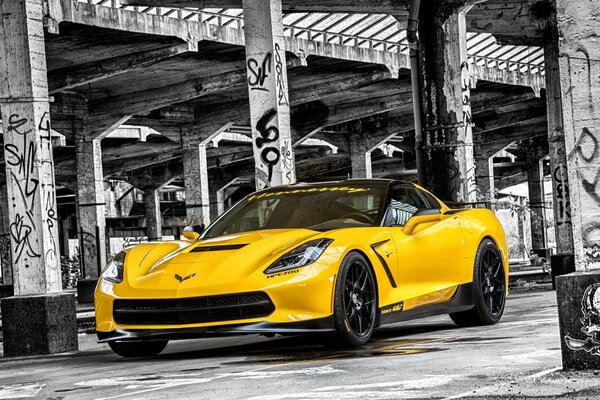 Yellow sports car chevrolet on black and white background