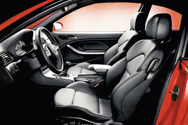 BMW car interior in red and black tones