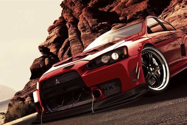 Mitsubishi car on the background of a mountain range