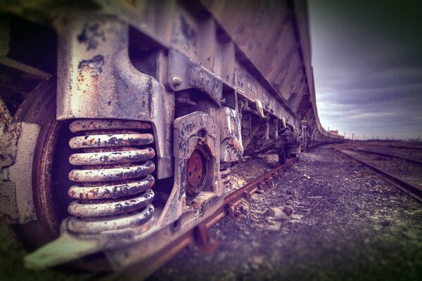 The spring of the train car on the railway