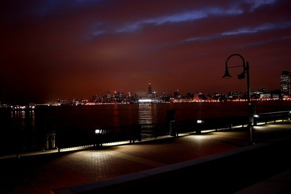 Lantern lights illuminate the embankment