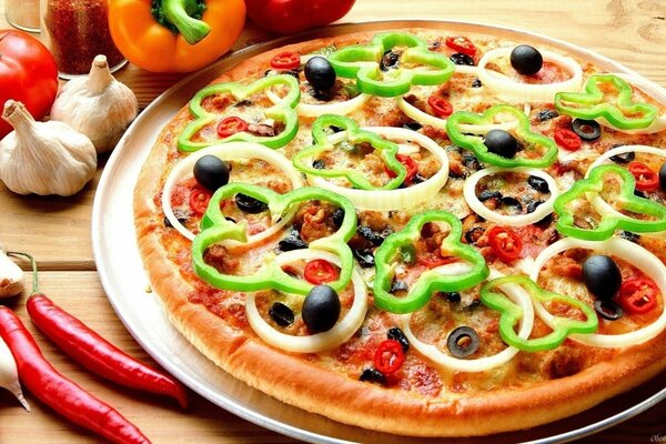 The most delicate Italian pizza with cheese, gravy and bell pepper