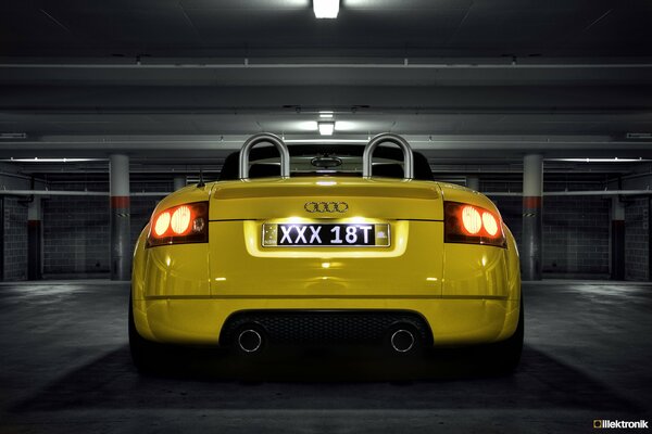 Rear illuminated audi TT in the parking lot