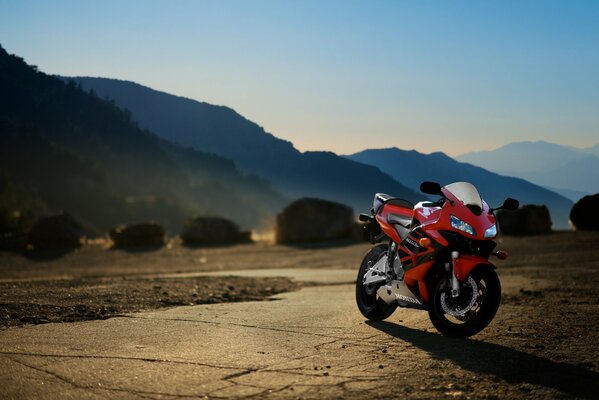 Honda motorcycle on the background of mountainous terrain