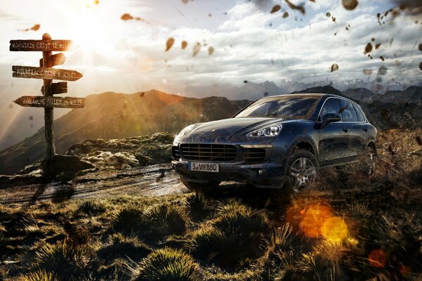 Porsche Cayenne sullo sfondo di un meraviglioso paesaggio