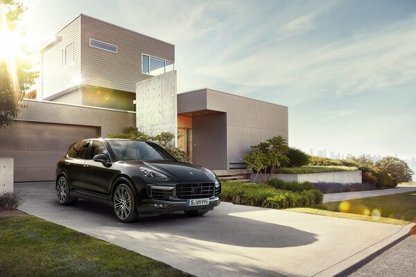 Black Porsche cayenne at home