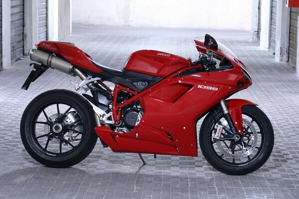 Red Italian motorbike in the garage