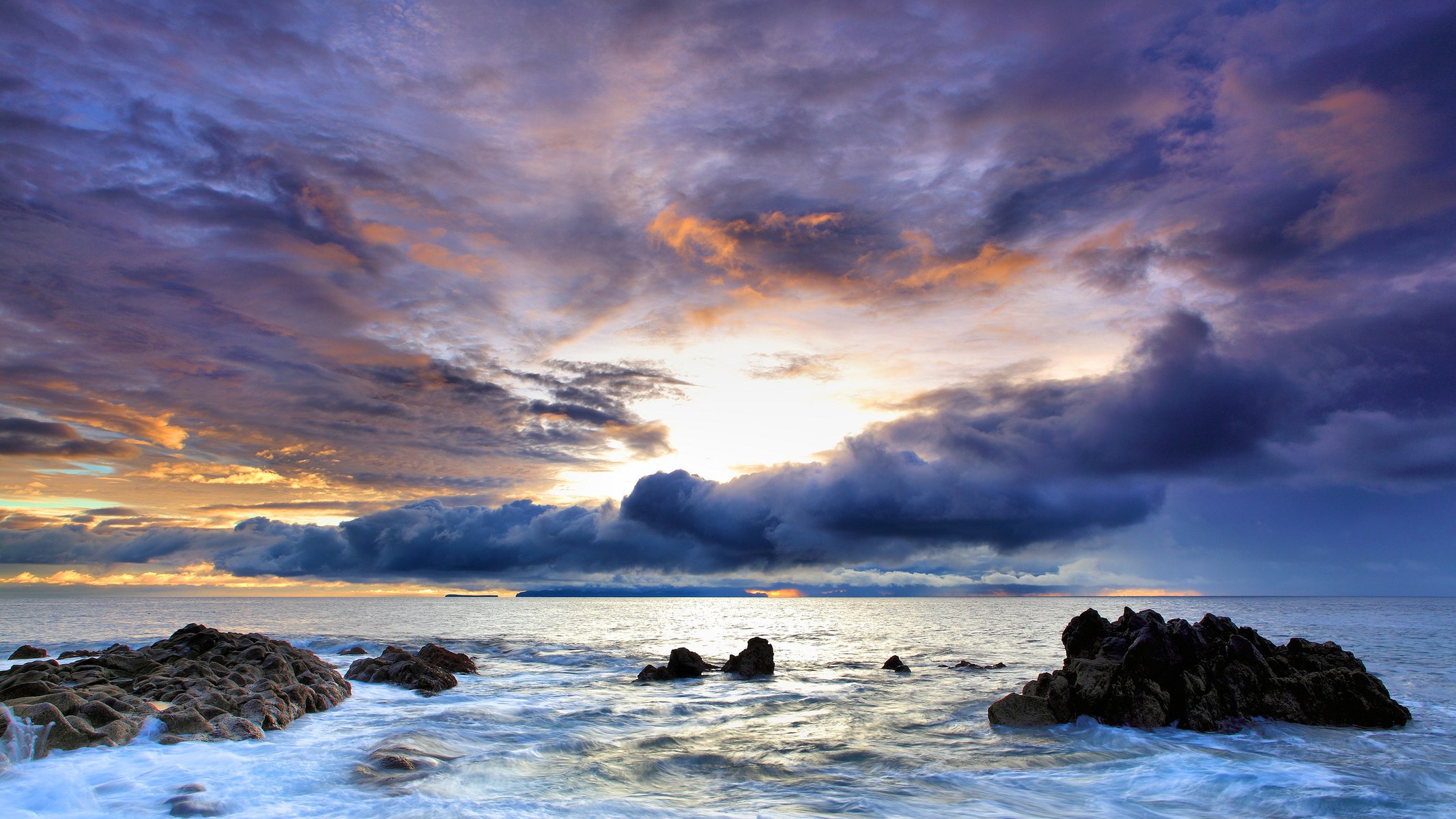 mar piedras nubes puesta de sol agua cielo naturaleza