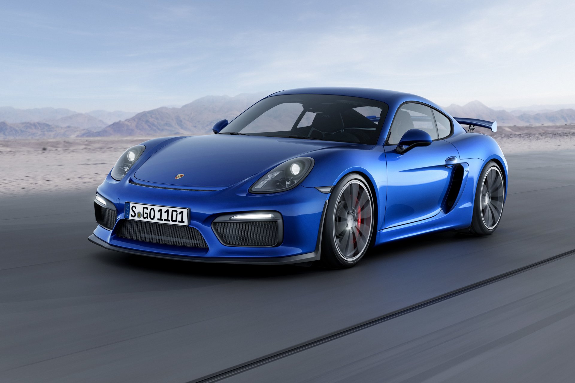 porsche cayman gt4 porsche cayman blue front mountains sky background