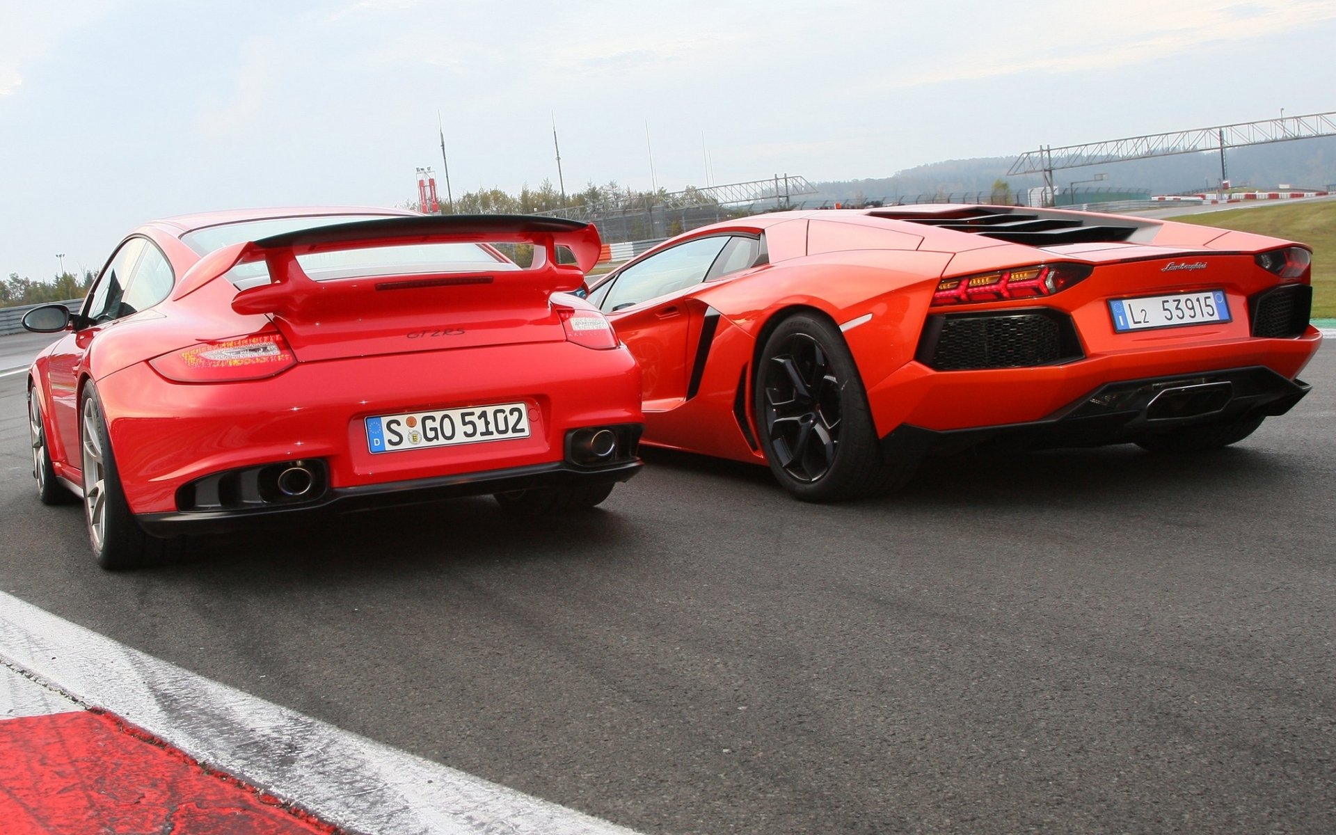 porsche 911 lamborghini aventador porsche lamborghini aventador supercars rear view