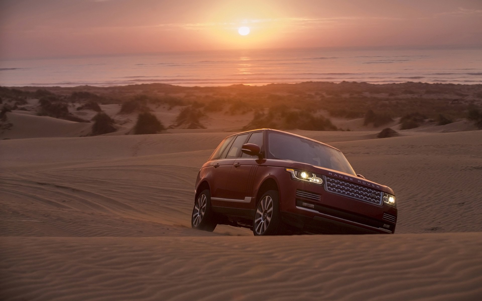 land rover range rover land rover renge rover jeep anteriore sabbia tramonto orizzonte sfondo