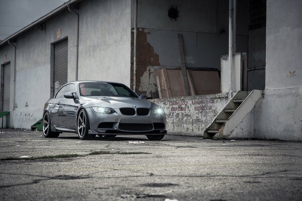 A silver car in an abandoned place