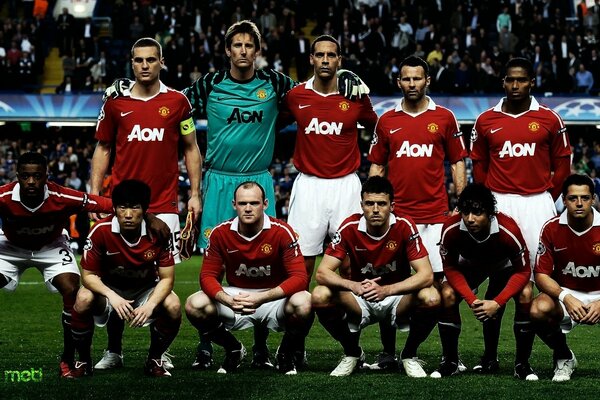 Foto del equipo de los futbolistas en el estadio