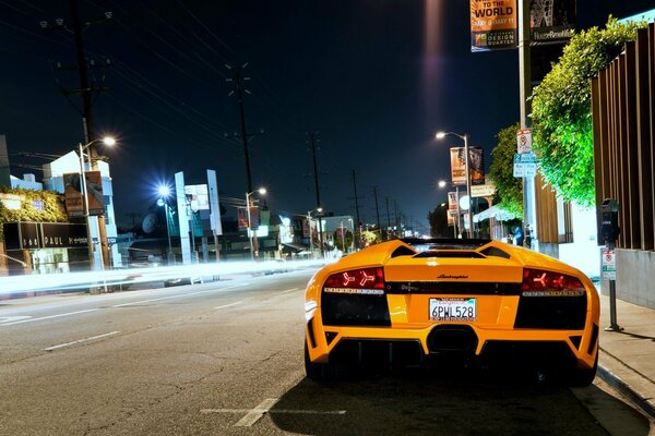 Yellow car and night city