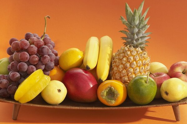 Fruit assortment on an orange background