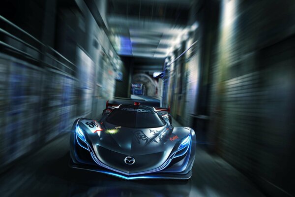 The concept of a Mazda car driving through a tunnel