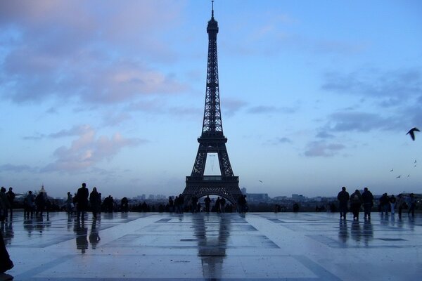 Eiffel Tower in Paris against the darkening sky