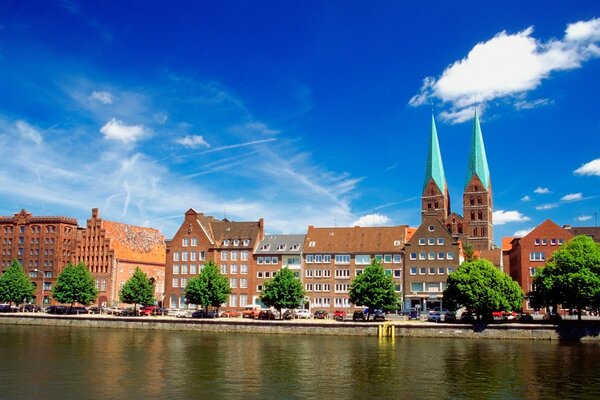 German houses with peaks on the river bank