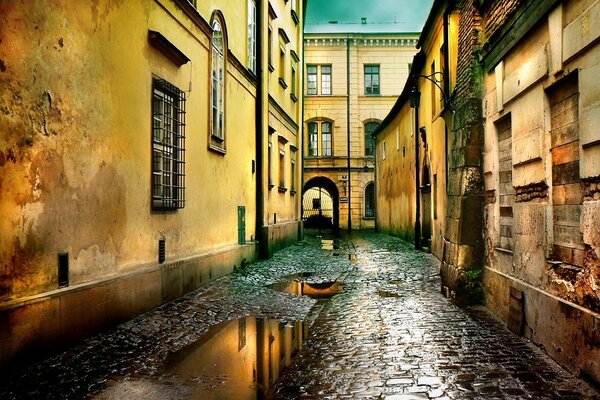 A narrow street after the rain