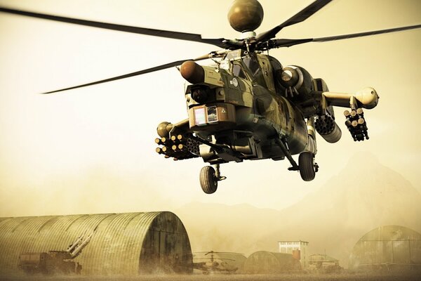 Military helicopter on the background of a military base
