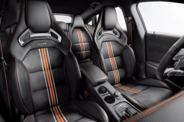 The interior of the Mercedes car is orange with black