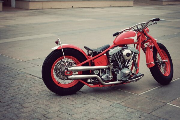 Vintage, red motorcycle on the road