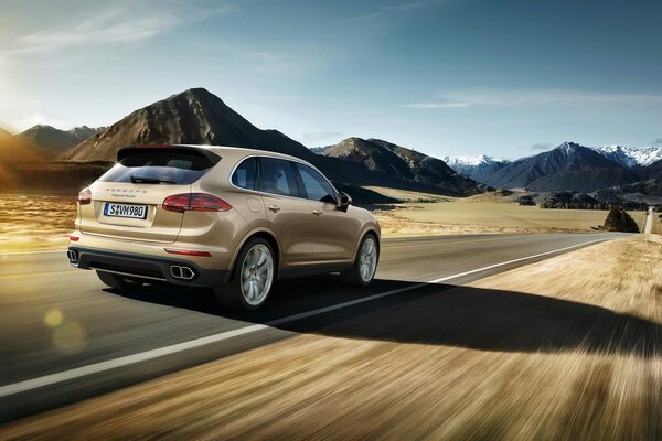 Car. Porsche Cayenne in motion on the road