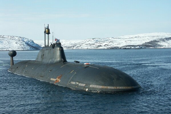 Submarine on the water in winter