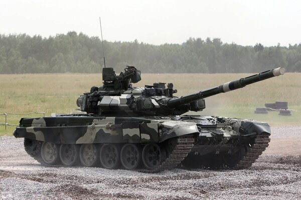 T-90 tank at the landfill in the field